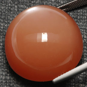 Pierre de lune orange naturelle coupe roude, 52,80 ct, opaque