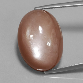 Pierre de lune orange naturelle coupe ovale, 26,52 ct, opaque