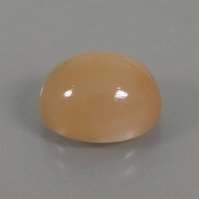 Pierre de Lune Crème orange doré naturelle Coupe ovale, 4.49 ct, Transparent