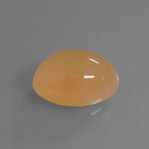 Pierre de lune orange naturelle coupe ovale, 6,14 ct, translucide
