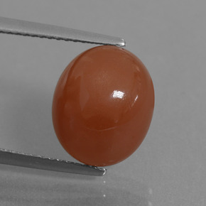 Pierre de lune rouge naturelle coupe ovale, 6,02 ct, translucide