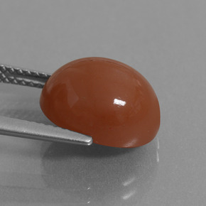 Pierre de lune rouge naturelle coupe ovale, 6,02 ct, translucide