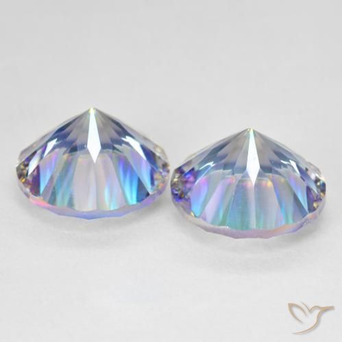 Shop natural 11.92ct Bleu multicolore Quartz mystique gems, Tour, from Brésil at GemSelect. In stock, global shipping!