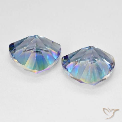 Shop natural 5.94ct Bleu multicolore Quartz mystique gems, Trillion, from Brésil at GemSelect. In stock, global shipping!