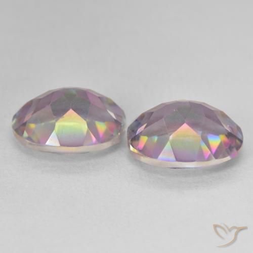Shop natural 6.87ct Multicolore Quartz mystique gems, ovale, from Brésil at GemSelect. In stock, global shipping!