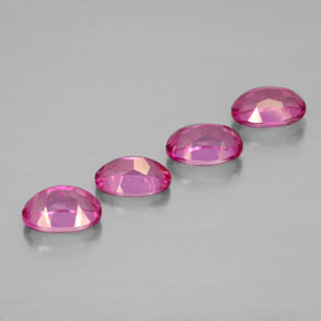 Achetez naturel ct rouge topaze mystique gems, coupe ovale, en provenance brésil chez gemselect. en stock, livraison internationale!