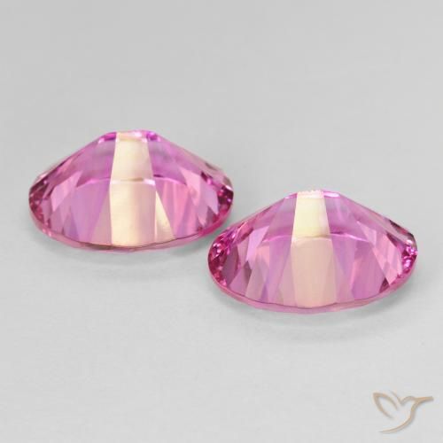 Shop natural 10.74ct Rose vif Topaze mystique gems, ovale, from Brésil at GemSelect. In stock, global shipping!
