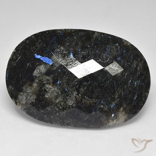 28.03ct Naturel Noir avec étincelle bleue Nuummite, ovale, Opaque