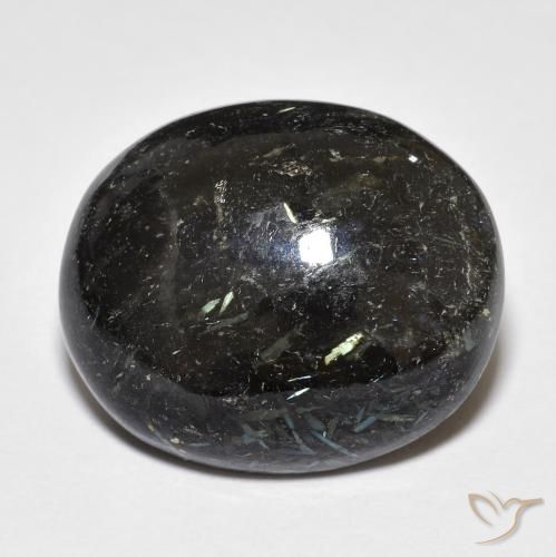 23.53ct Naturel Noir avec étincelle bleue Nuummite, ovale, Opaque