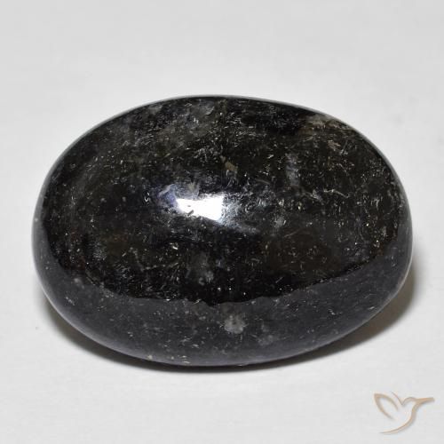 20.25ct Naturel Noir avec étincelle bleue Nuummite, ovale, Opaque