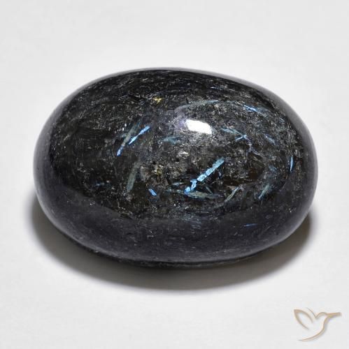 25.34ct Naturel Noir avec étincelle bleue Nuummite, ovale, Opaque
