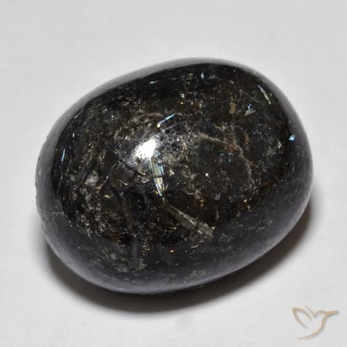Nuummite Noir avec étincelle bleue naturelle ovale, 27.76 ct, Opaque