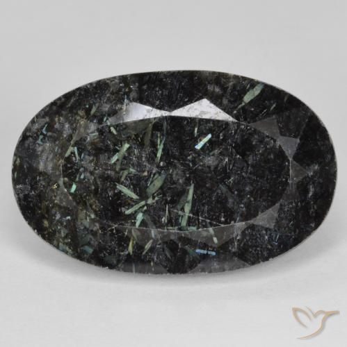 24.90ct Naturel Noir avec étincelle bleue Nuummite, ovale, Opaque