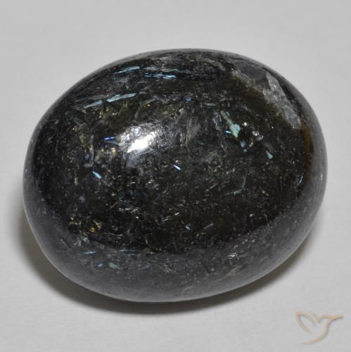 24.48ct Naturel Noir avec étincelle bleue Nuummite, ovale, Opaque