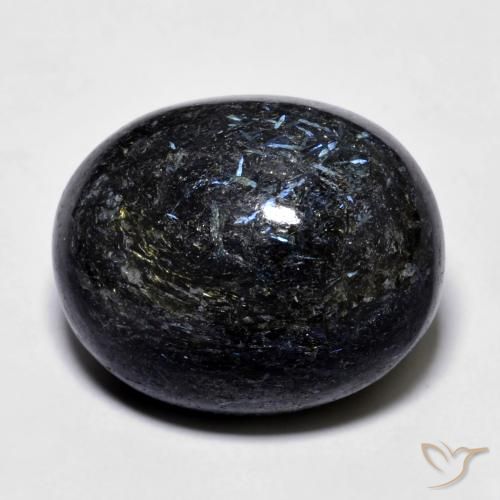 24.73ct Naturel Noir avec étincelle bleue Nuummite, ovale, Opaque