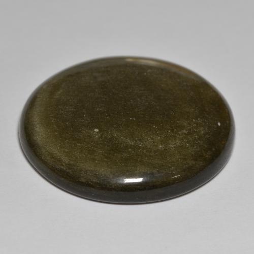 Obsidienne Noir avec reflets dorés naturelle Coupe roude, 40.64 ct, Opaque