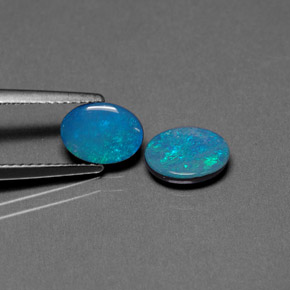 Achetez naturel ct multicolore doublet d'opale gems, coupe ovale, en provenance australie chez gemselect. en stock, livraison internationale!