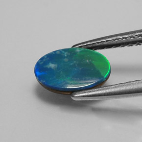 Opale Doublet Multicolore naturelle Coupe ovale, 0.73 ct, Opaque