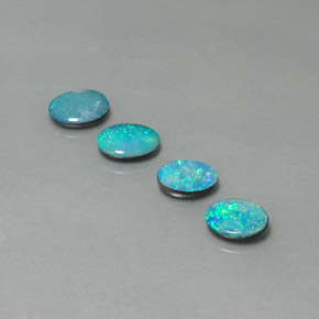 Achetez naturel ct multicolore doublet d'opale gems, coupe ovale, en provenance australie chez gemselect. en stock, livraison internationale!