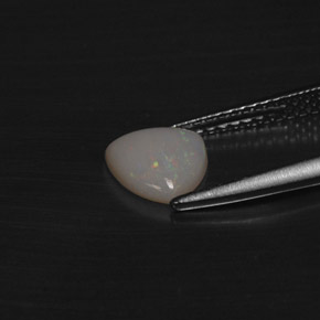 Opale multicolore naturelle trillion, 0,60 ct, translucide