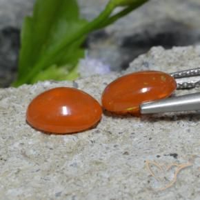 Shop natural 1.37ct Orange rouge foncé Opale gems, ovale, from Ethiopie at GemSelect. In stock, global shipping!