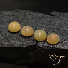 Shop natural 6.07ct Multicolore Opale gems, Tour, from Ethiopie at GemSelect. In stock, global shipping!