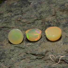 Shop natural 5.12ct Multicolore Opale gems, Tour, from Ethiopie at GemSelect. In stock, global shipping!