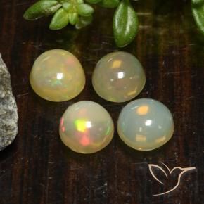 Shop natural 1.45ct Multicolore Opale gems, Tour, from Ethiopie at GemSelect. In stock, global shipping!