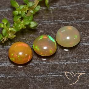 Shop natural 1.34ct Multicolore Opale gems, Tour, from Ethiopie at GemSelect. In stock, global shipping!