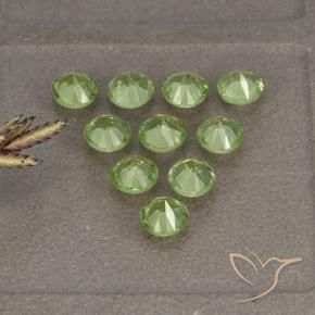 Shop natural 2.36ct Vert jaunâtre Péridot gems, Tour, from Chine at GemSelect. In stock, global shipping!