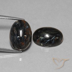 Shop natural 13.25ct Noire Pietersite gems, ovale, from Chine at GemSelect. In stock, global shipping!