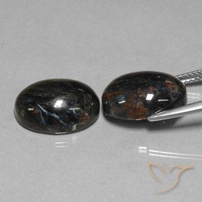 Shop natural 13.25ct Noire Pietersite gems, ovale, from Chine at GemSelect. In stock, global shipping!