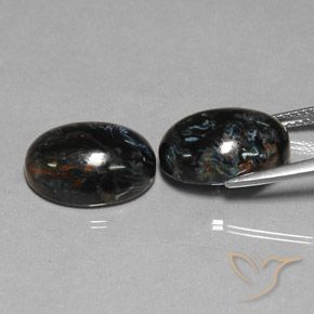 Shop natural 12.75ct Noire Pietersite gems, ovale, from Chine at GemSelect. In stock, global shipping!