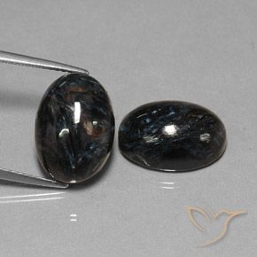 Shop natural 13.21ct Noire Pietersite gems, ovale, from Chine at GemSelect. In stock, global shipping!