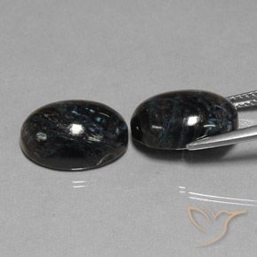 Shop natural 13.21ct Noire Pietersite gems, ovale, from Chine at GemSelect. In stock, global shipping!