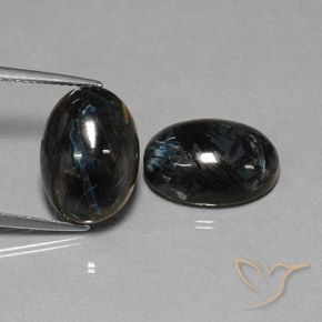 Shop natural 12.68ct Noire Pietersite gems, ovale, from Chine at GemSelect. In stock, global shipping!