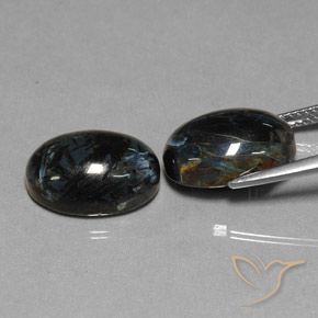 Shop natural 12.68ct Noire Pietersite gems, ovale, from Chine at GemSelect. In stock, global shipping!