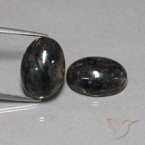 Shop natural 12.81ct Noire Pietersite gems, ovale, from Chine at GemSelect. In stock, global shipping!