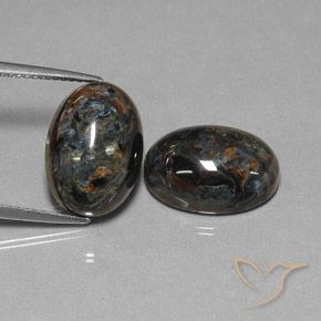 Shop natural 12.85ct Noire Pietersite gems, ovale, from Chine at GemSelect. In stock, global shipping!
