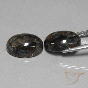 Shop natural 12.85ct Noire Pietersite gems, ovale, from Chine at GemSelect. In stock, global shipping!