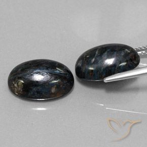Shop natural 12.08ct Noire Pietersite gems, ovale, from Chine at GemSelect. In stock, global shipping!