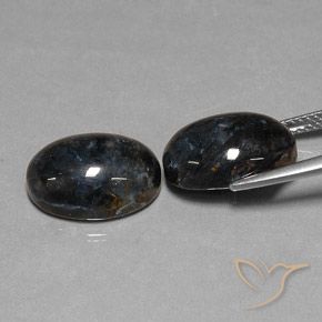Shop natural 12.68ct Noire Pietersite gems, ovale, from Chine at GemSelect. In stock, global shipping!