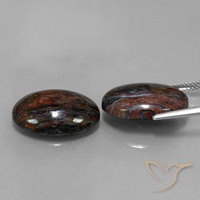 Shop natural 16.77ct Noire Pietersite gems, ovale, from Namibie at GemSelect. In stock, global shipping!