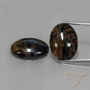 Achetez naturel 15.26ct Noire Pietersite gems, Coupe ovale, En provenance Namibie chez GemSelect. En stock, livraison internationale!