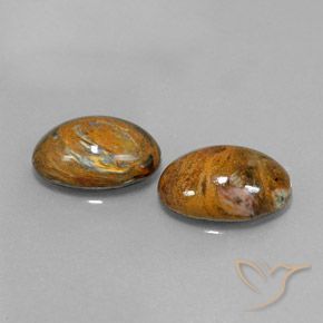 Shop natural 9.38ct Multicolore Pietersite gems, ovale, from Namibie at GemSelect. In stock, global shipping!