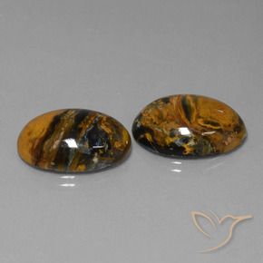 Shop natural 25.29ct Multicolore Pietersite gems, ovale, from Namibie at GemSelect. In stock, global shipping!