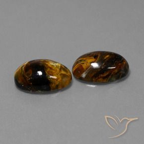 Shop natural 9.80ct Multicolore Pietersite gems, ovale, from Namibie at GemSelect. In stock, global shipping!