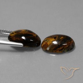 Shop natural 9.80ct Multicolore Pietersite gems, ovale, from Namibie at GemSelect. In stock, global shipping!