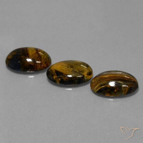 Shop natural 12.70ct Multicolore Pietersite gems, ovale, from Namibie at GemSelect. In stock, global shipping!