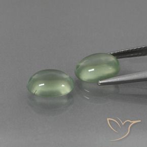 Shop natural 4.18ct Vert moyen Préhnite gems, ovale, from Afrique du Sud at GemSelect. In stock, global shipping!